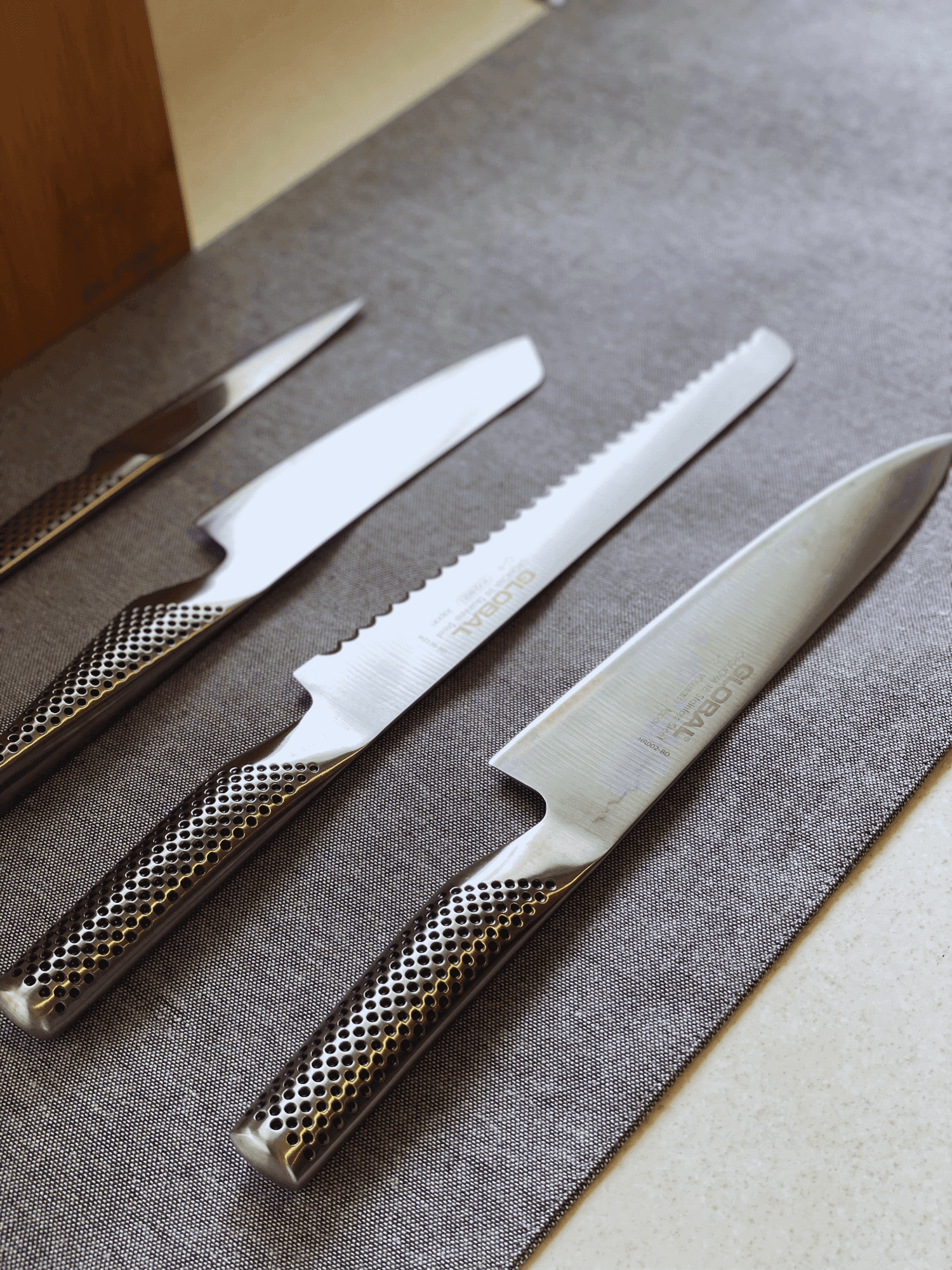 Global Japanese knives on a cloth
