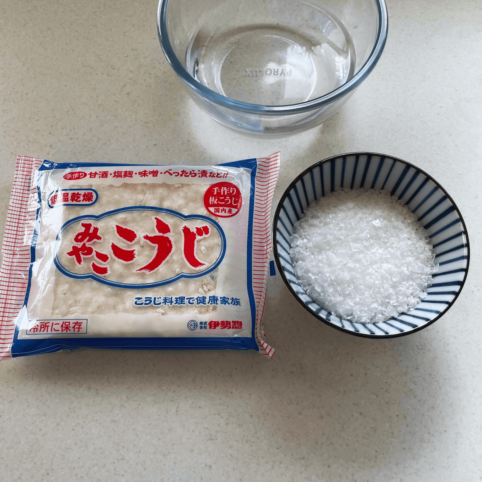 Miyako Koji dried rice koji, sea salt and water measured for making shio koji