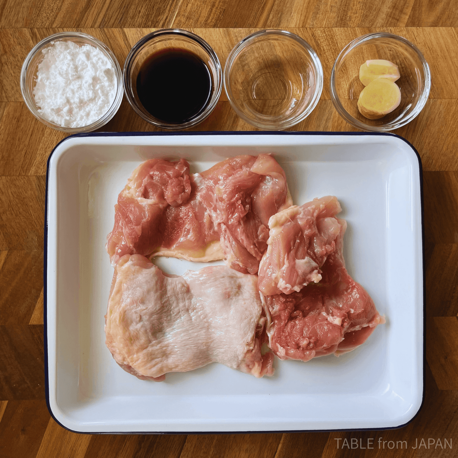 Chicken and marinade ingredients for Japanese fried chicken karaage