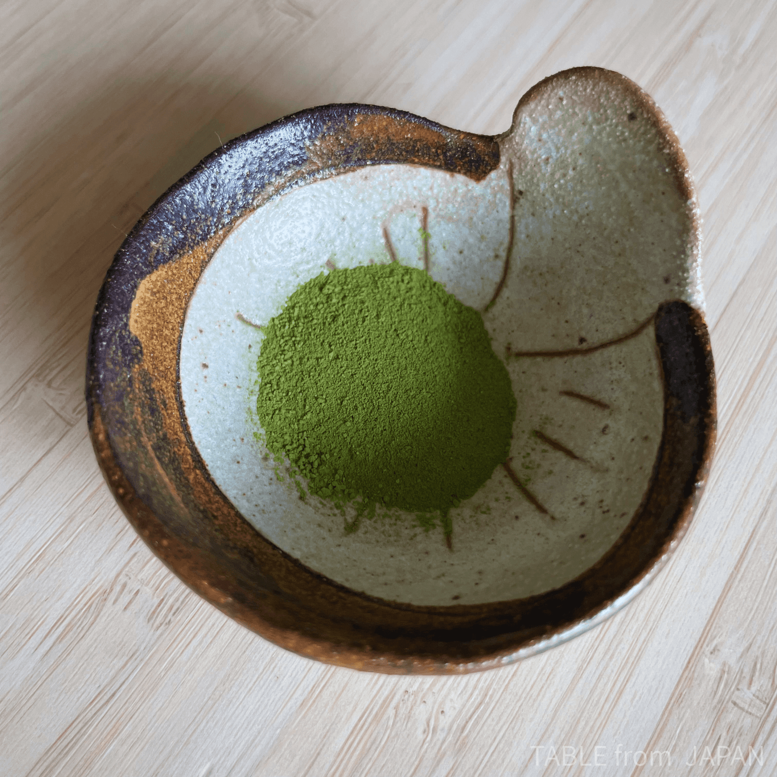 Matcha salt served in a small bowl