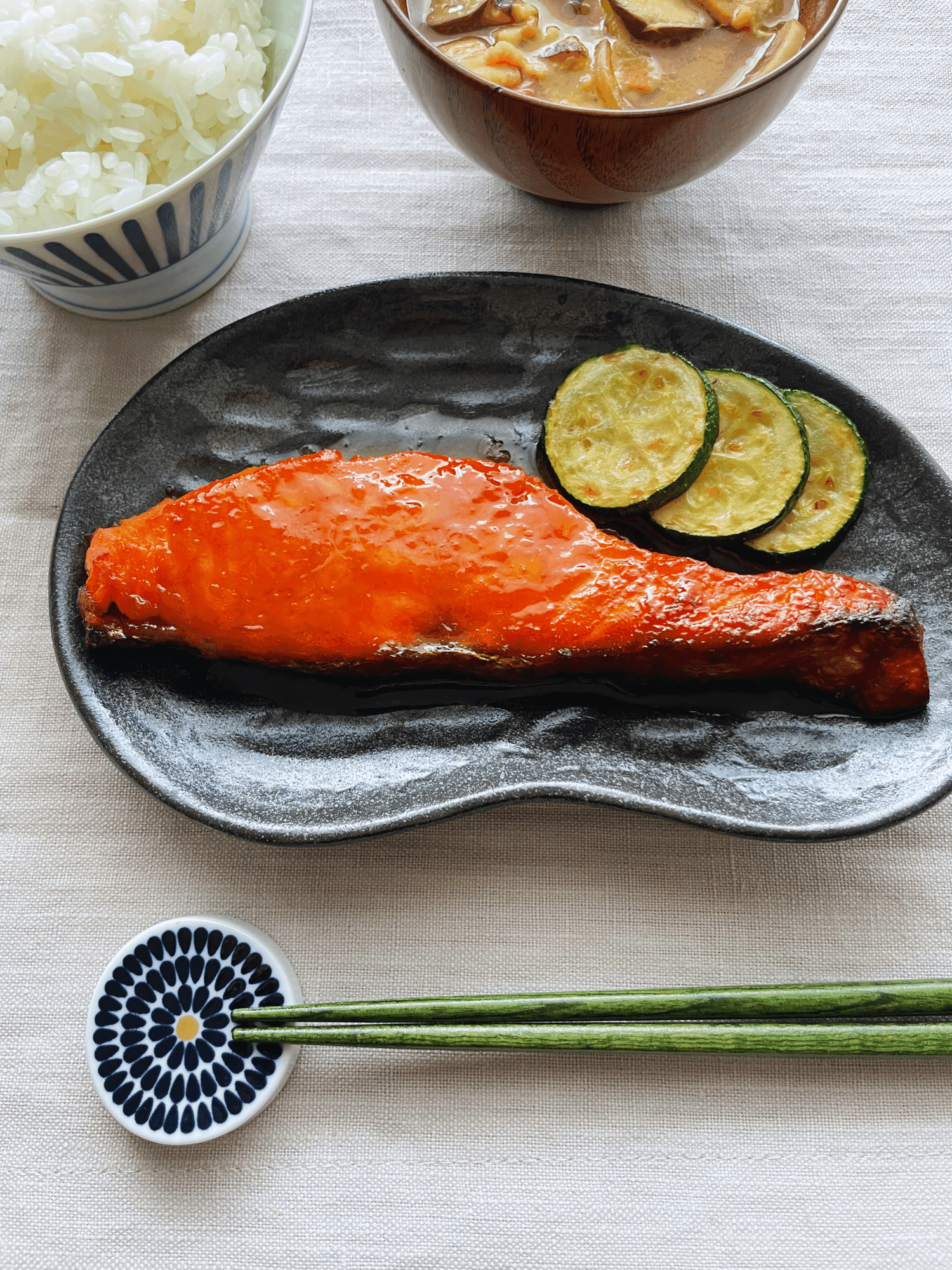Oven-baked miso salmon served with rice and vegetables