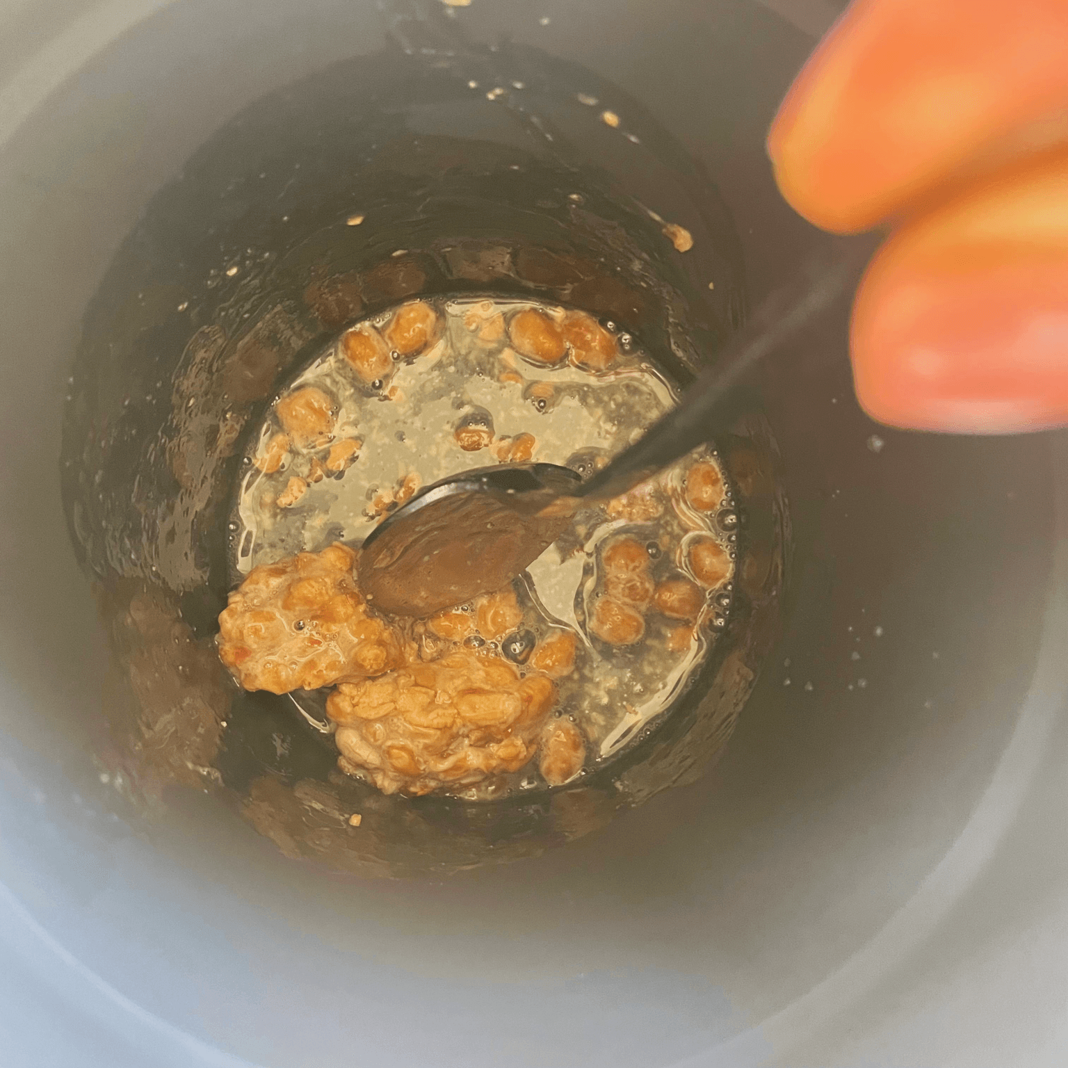 Frozen natto mixed with boiling water for homemade natto starter