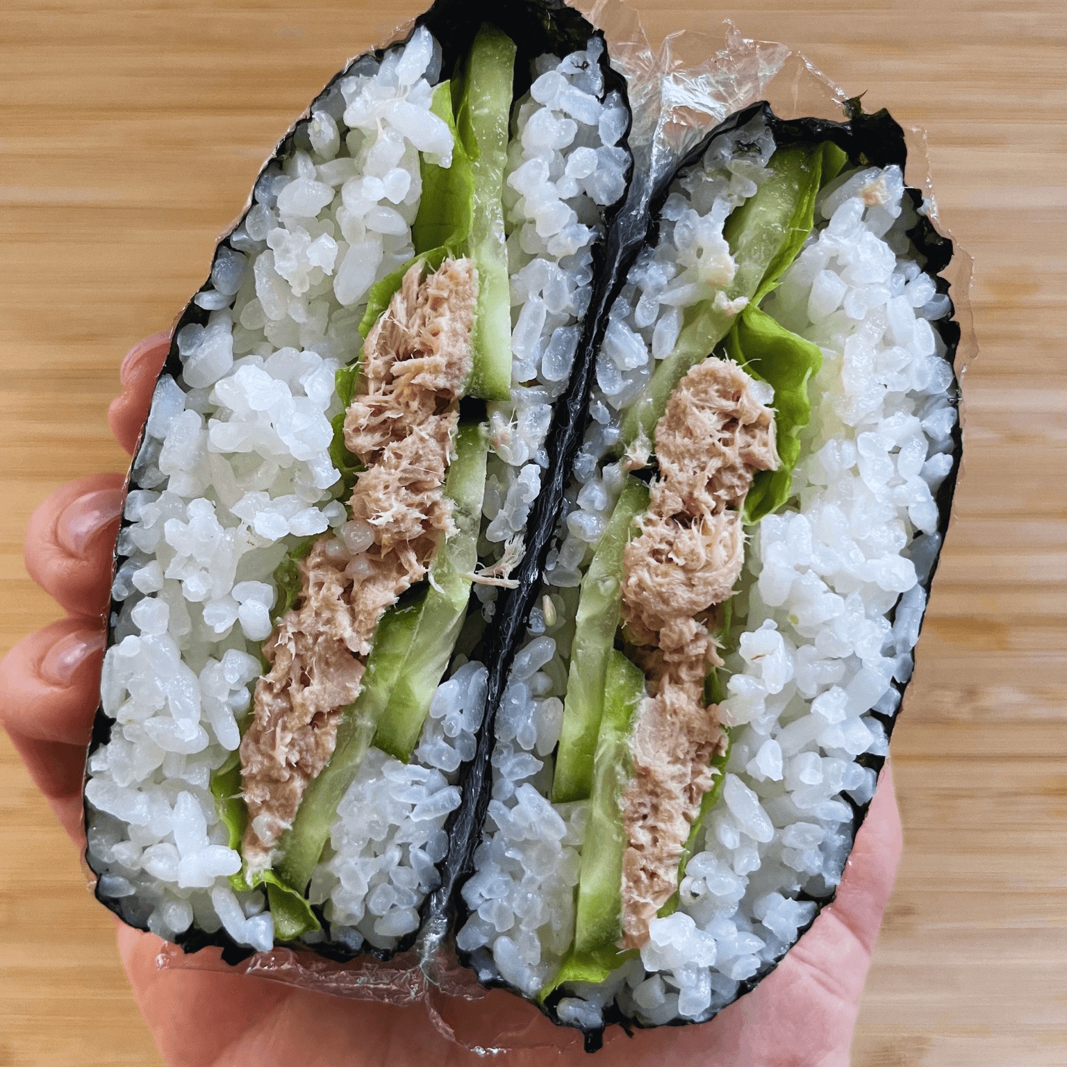 Tuna mayo onigirazu cut in half
