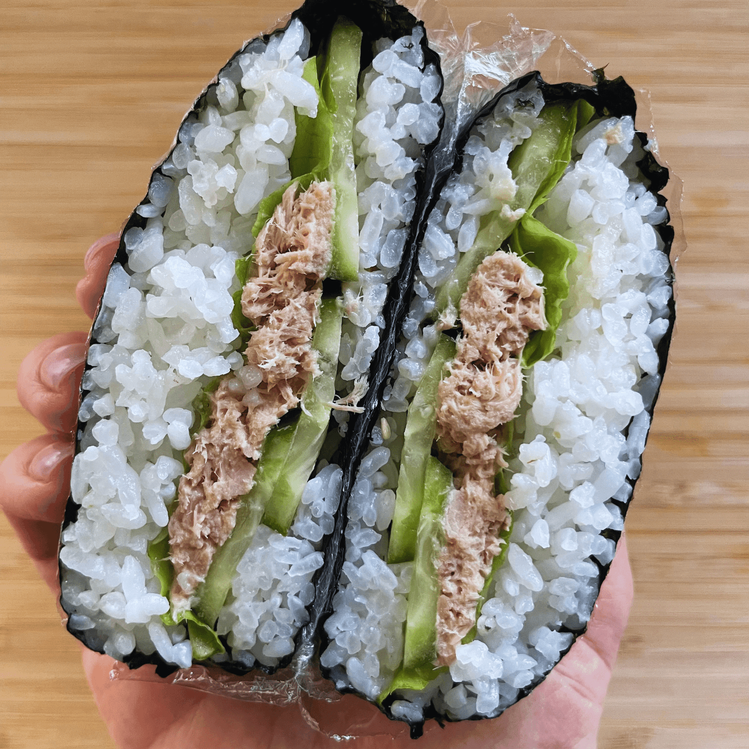 Tuna mayo onigirazu cut in half