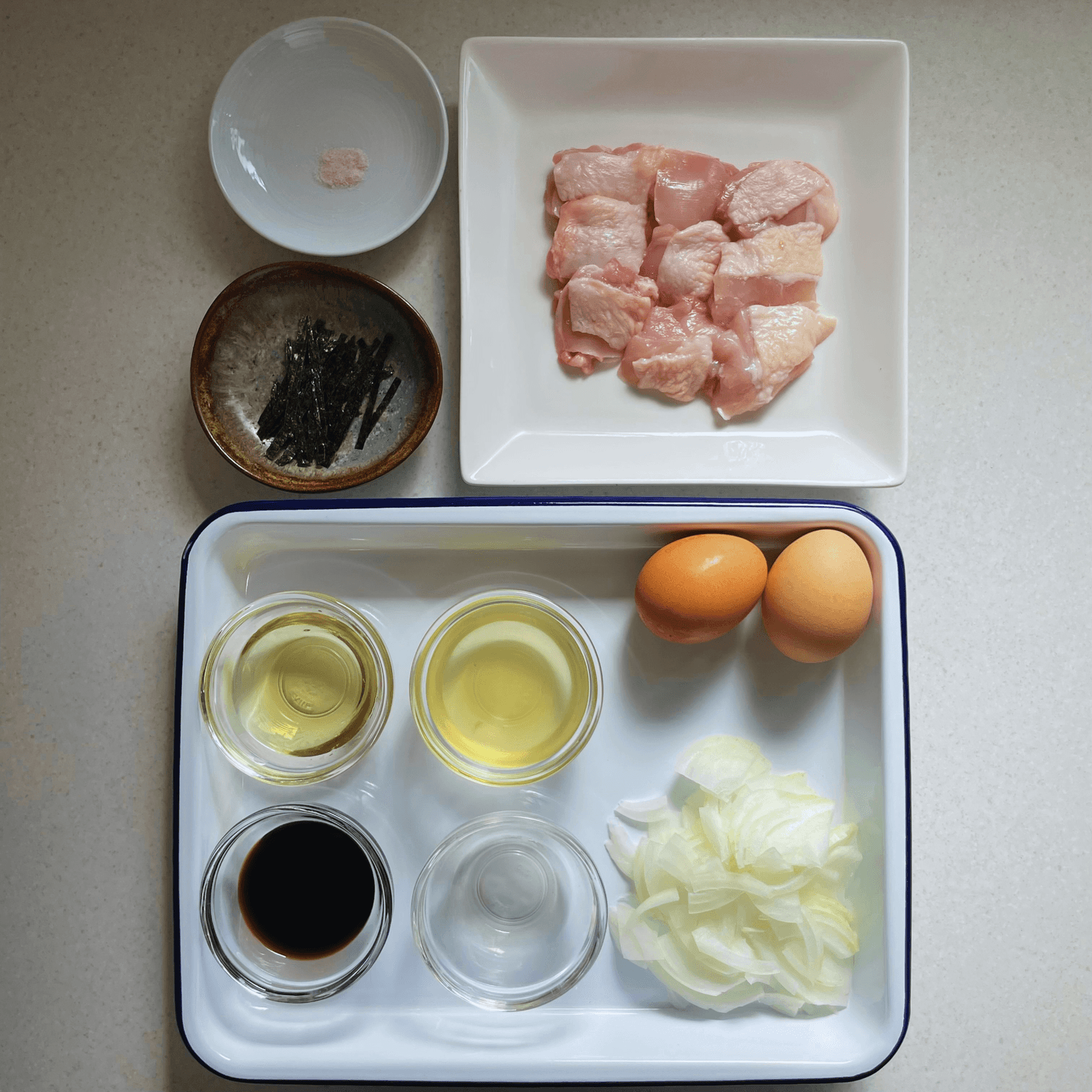 Chicken, egg, onion and rice ingredients for oyakodon