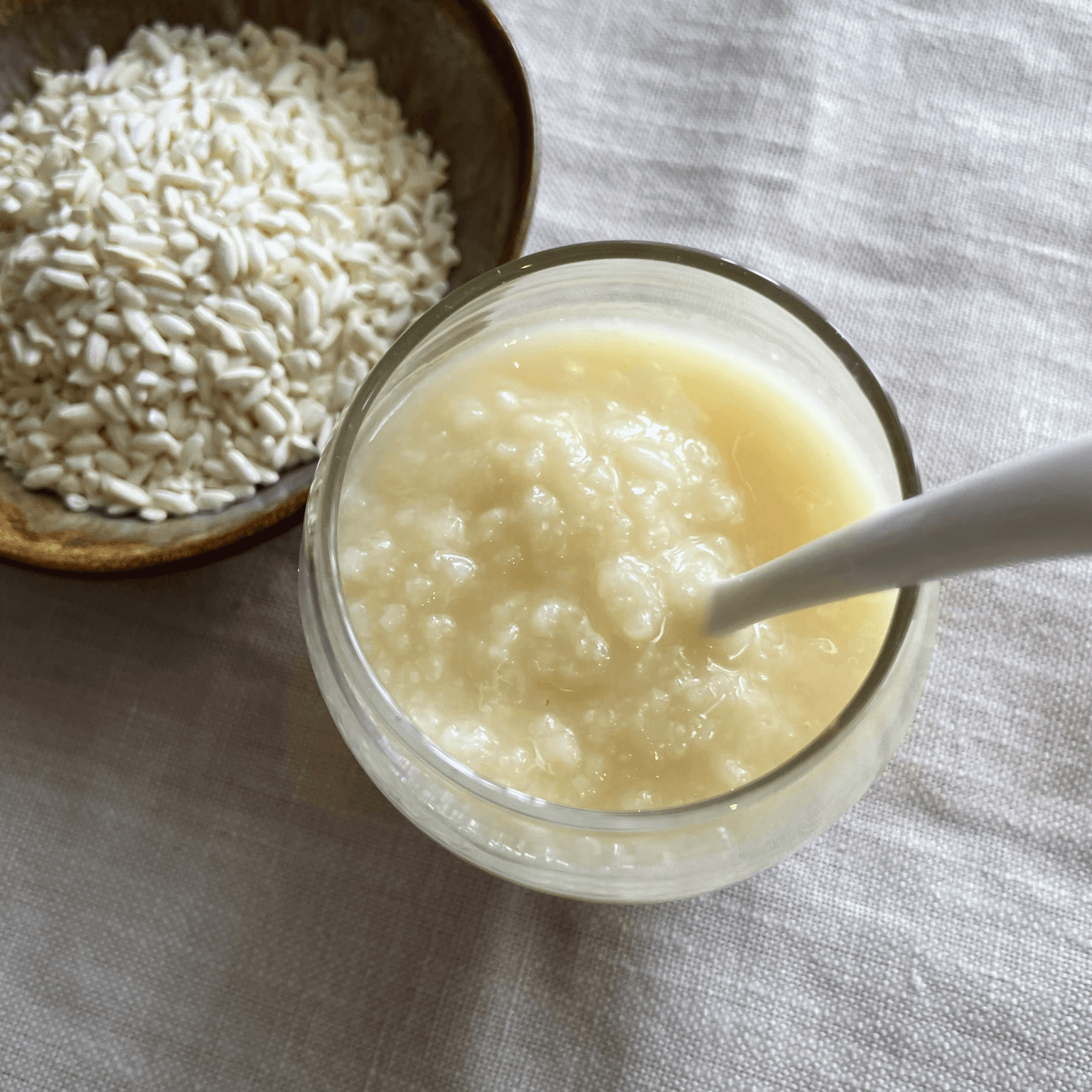 Rice koji and shio koji in a glass jar